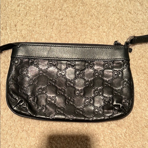 Gucci Black Clutch with Embossed Pattern and Zipper Closure - Picture 1 of 1